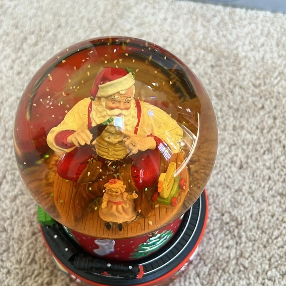 Hallmark Coca cola santa musical snow globe.